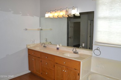 CURRENTLY UNDER CONTRACT, SELLER WILL CONSIDER BACKUP OFFERS on Holiday Golf Club in Florida - for sale on GolfHomes.com, golf home, golf lot