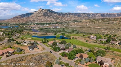 Find comfort and charm in a home nestled on the scenic fairways on Battlement Mesa Golf Course in Colorado - for sale on GolfHomes.com, golf home, golf lot