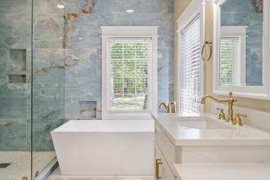 Exquisite 5-Bedroom Retreat on the Golf Course in Dunes West on Dunes West Golf Club in South Carolina - for sale on GolfHomes.com, golf home, golf lot