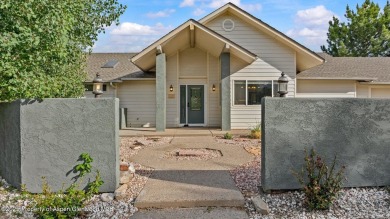 Find comfort and charm in a home nestled on the scenic fairways on Battlement Mesa Golf Course in Colorado - for sale on GolfHomes.com, golf home, golf lot