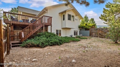 Find comfort and charm in a home nestled on the scenic fairways on Battlement Mesa Golf Course in Colorado - for sale on GolfHomes.com, golf home, golf lot