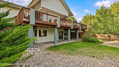 Find comfort and charm in a home nestled on the scenic fairways on Battlement Mesa Golf Course in Colorado - for sale on GolfHomes.com, golf home, golf lot