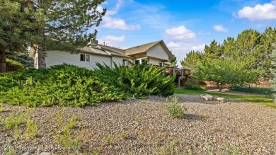 Find comfort and charm in a home nestled on the scenic fairways on Battlement Mesa Golf Course in Colorado - for sale on GolfHomes.com, golf home, golf lot