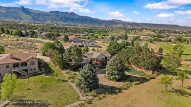 Find comfort and charm in a home nestled on the scenic fairways on Battlement Mesa Golf Course in Colorado - for sale on GolfHomes.com, golf home, golf lot