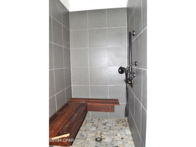 CURRENTLY UNDER CONTRACT, SELLER WILL CONSIDER BACKUP OFFERS on Holiday Golf Club in Florida - for sale on GolfHomes.com, golf home, golf lot