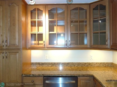 OUTSTANDING GOLF COURSE VIEWS from this 3 bedroom 2 bath bright on Palm-Aire Country Club and Resort - Palms in Florida - for sale on GolfHomes.com, golf home, golf lot