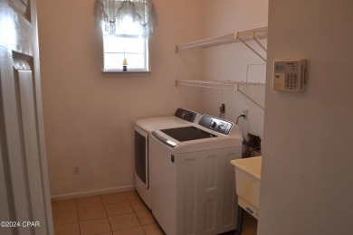 CURRENTLY UNDER CONTRACT, SELLER WILL CONSIDER BACKUP OFFERS on Holiday Golf Club in Florida - for sale on GolfHomes.com, golf home, golf lot