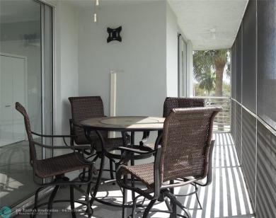OUTSTANDING GOLF COURSE VIEWS from this 3 bedroom 2 bath bright on Palm-Aire Country Club and Resort - Palms in Florida - for sale on GolfHomes.com, golf home, golf lot