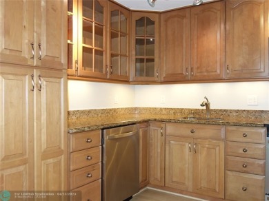 OUTSTANDING GOLF COURSE VIEWS from this 3 bedroom 2 bath bright on Palm-Aire Country Club and Resort - Palms in Florida - for sale on GolfHomes.com, golf home, golf lot