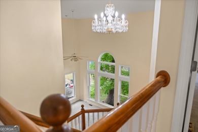 Welcome to this classic brick-front traditional southern home on Country Club of Gwinnett in Georgia - for sale on GolfHomes.com, golf home, golf lot