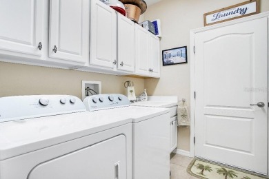 Resort Style Living - Turnkey fully furnished maintenance free on River Strand Golf and Country Club At Heritage Harbour  in Florida - for sale on GolfHomes.com, golf home, golf lot