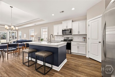 A golfer's dream! Light, bright, and truly move-in ready, this on Savannah Quarters Country Club in Georgia - for sale on GolfHomes.com, golf home, golf lot