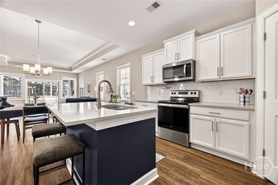 A golfer's dream! Light, bright, and truly move-in ready, this on Savannah Quarters Country Club in Georgia - for sale on GolfHomes.com, golf home, golf lot