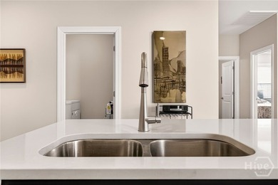 A golfer's dream! Light, bright, and truly move-in ready, this on Savannah Quarters Country Club in Georgia - for sale on GolfHomes.com, golf home, golf lot