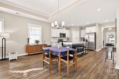 A golfer's dream! Light, bright, and truly move-in ready, this on Savannah Quarters Country Club in Georgia - for sale on GolfHomes.com, golf home, golf lot