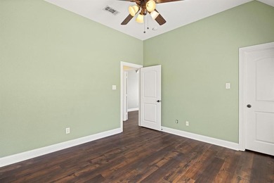 Beautiful 3-bedroom, 2.5-bath home with an oversized 3-car on Pecan Plantation Country Club in Texas - for sale on GolfHomes.com, golf home, golf lot