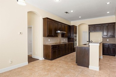 Beautiful 3-bedroom, 2.5-bath home with an oversized 3-car on Pecan Plantation Country Club in Texas - for sale on GolfHomes.com, golf home, golf lot