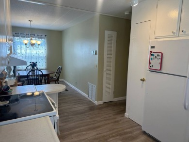 991 Haiti E Venice FL  34285  Bay Indies 55+ Mobile Home on Bird Bay Executive Golf Club in Florida - for sale on GolfHomes.com, golf home, golf lot