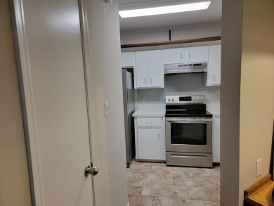 Fabulous move in ready townhome with golf course views.  Both on Hilaman Park Golf Course in Florida - for sale on GolfHomes.com, golf home, golf lot
