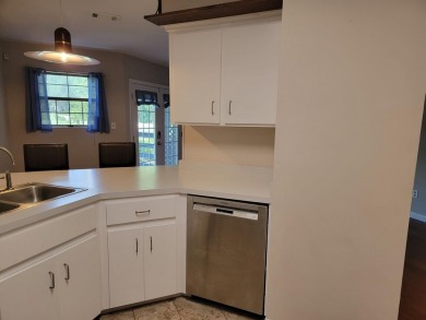 Fabulous move in ready townhome with golf course views.  Both on Hilaman Park Golf Course in Florida - for sale on GolfHomes.com, golf home, golf lot