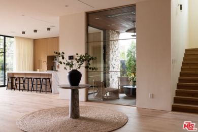 Contemporary architecture meets minimalist organic finishes in on Lakeside Golf Club in California - for sale on GolfHomes.com, golf home, golf lot