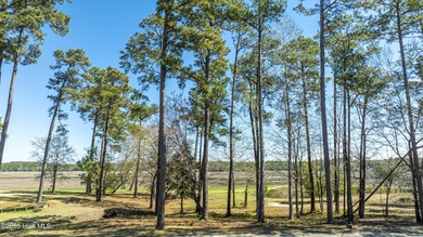 Experience the perfect blend of golf course living and coastal on Rivers Edge Golf Club in North Carolina - for sale on GolfHomes.com, golf home, golf lot