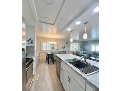 This beautifully renovated 2-bedroom, 2-bath home in the PET on Fairway Village Golf Course in Florida - for sale on GolfHomes.com, golf home, golf lot