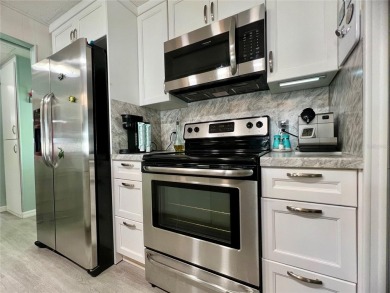 This beautifully renovated 2-bedroom, 2-bath home in the PET on Fairway Village Golf Course in Florida - for sale on GolfHomes.com, golf home, golf lot