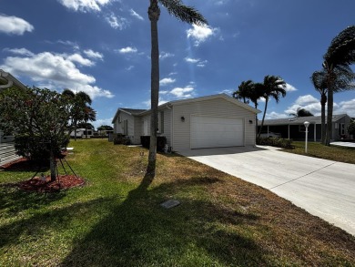 Looking for a three  bedroom two bathroom home on the water on Savanna Golf Club in Florida - for sale on GolfHomes.com, golf home, golf lot