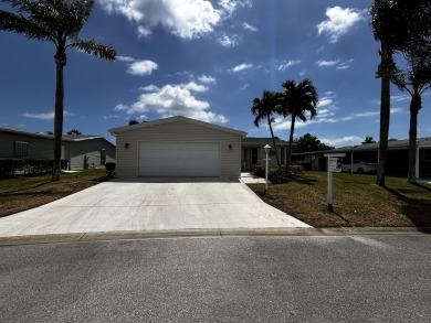 Looking for a three  bedroom two bathroom home on the water on Savanna Golf Club in Florida - for sale on GolfHomes.com, golf home, golf lot