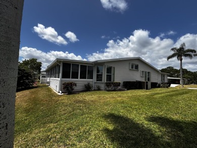 Looking for a three  bedroom two bathroom home on the water on Savanna Golf Club in Florida - for sale on GolfHomes.com, golf home, golf lot