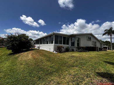 Looking for a three  bedroom two bathroom home on the water on Savanna Golf Club in Florida - for sale on GolfHomes.com, golf home, golf lot