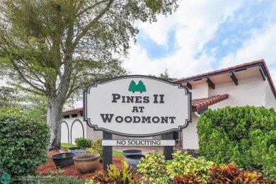 Welcome to Pines 2 at Woodmont Country Club (non-equity; all on Woodmont Country Club in Florida - for sale on GolfHomes.com, golf home, golf lot