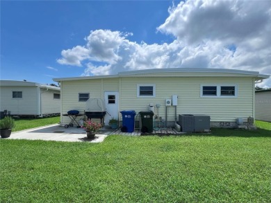 This beautifully renovated 2-bedroom, 2-bath home in the PET on Fairway Village Golf Course in Florida - for sale on GolfHomes.com, golf home, golf lot