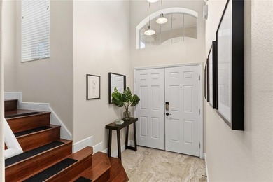 Beautiful Water-View Pool Home in Gated Golf Course Community - on Stoneybrook West in Florida - for sale on GolfHomes.com, golf home, golf lot