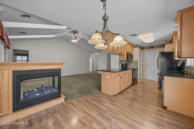 Enjoy easy living in this 2-bedroom, 2-bath patio home located on Cypress Landing Golf Club in North Carolina - for sale on GolfHomes.com, golf home, golf lot