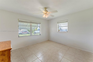 Welcome to effortless living in this charming 2BD/2BA on Leisureville Community Association in Florida - for sale on GolfHomes.com, golf home, golf lot