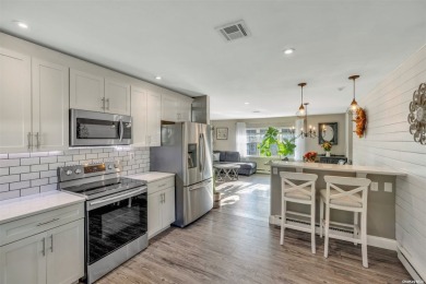 Homeowners pride exudes in this Baronet model condo boasting on Leisure Village Golf Course in New York - for sale on GolfHomes.com, golf home, golf lot