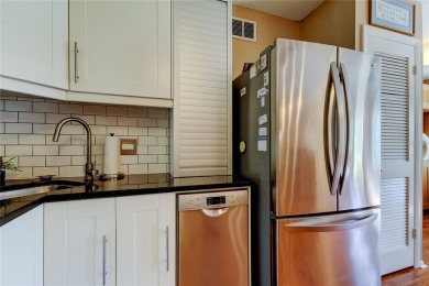 Welcome to carefree living in this spacious ground-floor condo on On Top Of The World Golf Course in Florida - for sale on GolfHomes.com, golf home, golf lot