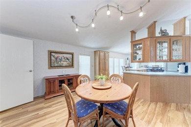 Welcome to this 3-bedroom, 2-bath fully furnished turnkey mobile on Kings Gate Golf Club in Florida - for sale on GolfHomes.com, golf home, golf lot
