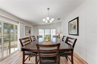 Welcome to this 3-bedroom, 2-bath fully furnished turnkey mobile on Kings Gate Golf Club in Florida - for sale on GolfHomes.com, golf home, golf lot