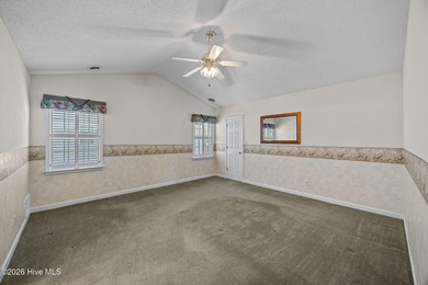 Enjoy easy living in this 2-bedroom, 2-bath patio home located on Cypress Landing Golf Club in North Carolina - for sale on GolfHomes.com, golf home, golf lot