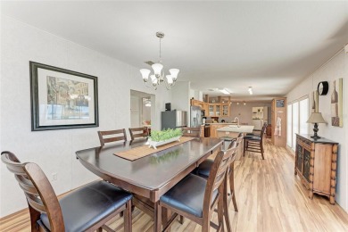Welcome to this 3-bedroom, 2-bath fully furnished turnkey mobile on Kings Gate Golf Club in Florida - for sale on GolfHomes.com, golf home, golf lot