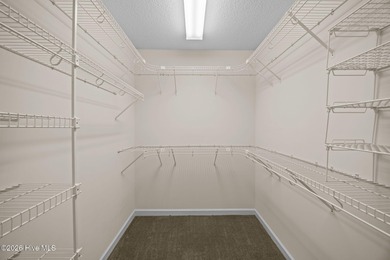 Enjoy easy living in this 2-bedroom, 2-bath patio home located on Cypress Landing Golf Club in North Carolina - for sale on GolfHomes.com, golf home, golf lot