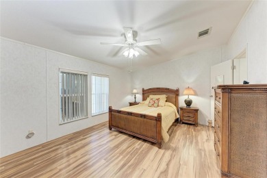 Welcome to this 3-bedroom, 2-bath fully furnished turnkey mobile on Kings Gate Golf Club in Florida - for sale on GolfHomes.com, golf home, golf lot