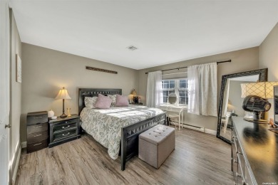 Homeowners pride exudes in this Baronet model condo boasting on Leisure Village Golf Course in New York - for sale on GolfHomes.com, golf home, golf lot