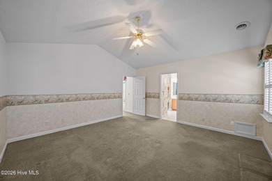 Enjoy easy living in this 2-bedroom, 2-bath patio home located on Cypress Landing Golf Club in North Carolina - for sale on GolfHomes.com, golf home, golf lot