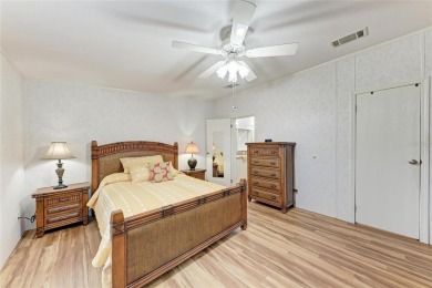 Welcome to this 3-bedroom, 2-bath fully furnished turnkey mobile on Kings Gate Golf Club in Florida - for sale on GolfHomes.com, golf home, golf lot