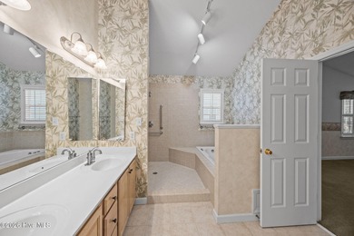 Enjoy easy living in this 2-bedroom, 2-bath patio home located on Cypress Landing Golf Club in North Carolina - for sale on GolfHomes.com, golf home, golf lot