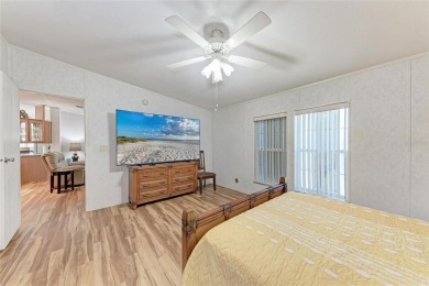 Welcome to this 3-bedroom, 2-bath fully furnished turnkey mobile on Kings Gate Golf Club in Florida - for sale on GolfHomes.com, golf home, golf lot